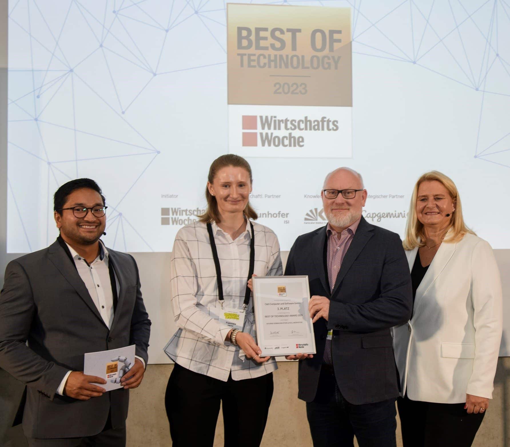 Best of Technology Award 2023 der WirtschaftsWoche, der von zwei Mitarbeitenden von C&S entgegengenommen wird.